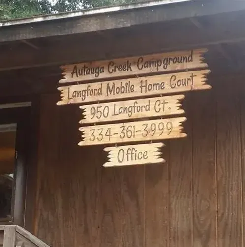 Carved wooden signs at the office: Autauga Creek Campground, Langford Mobile Home Court, 950 Langford Ct., 334-361-3999, Office